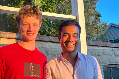 Sam Nashel and Mihir Sharma standing side by side and smiling at the camera