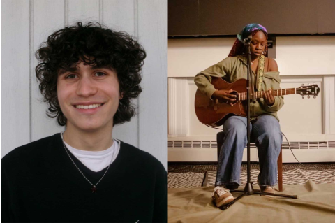 There is a person sitting in a chair playing the guitar and a person with curly black hair standing against a white wall